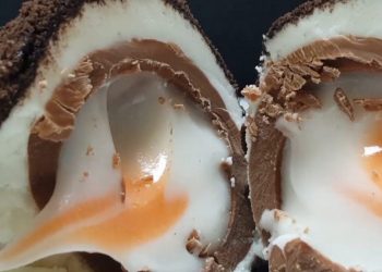 See SWNS story SWEGG: A chef has revealed his egg-traordinary recipe for a scotch egg - made from crushed Oreos and a CREME EGG. Chef Ben Churchill, 30, has transformed the traditional British savoury treat into a sweet dish that features a gooey Creme Egg at its centre. The unconventional snack swaps sausage meat for the creamy filling of an Oreo and is rolled in blended Oreo biscuits which resemble a Scotch egg's breadcrumbs. Having worked in the industry for 10 years, Ben is a self-trained chef and plating artist and has created