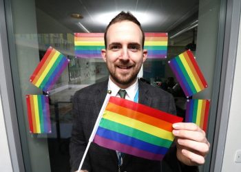 Daniel Gray a teacher at Harris Academy in Croydon. See National copy NNGAY: Walking through Harris Academy South Norwood, it appears like any other school, as it proudly showcases its pupils' achievements. However, amongst children's artwork and awards, the halls are decorated with rainbow gay-pride flags. That is because the secondary school is leading the way in promoting diversity and celebrating LGBT (lesbian, gay, bisesxual, transgender) rights. And it is all down to one teacher, Daniel Gray - who took the brave decision to come out to 1,000 students.
