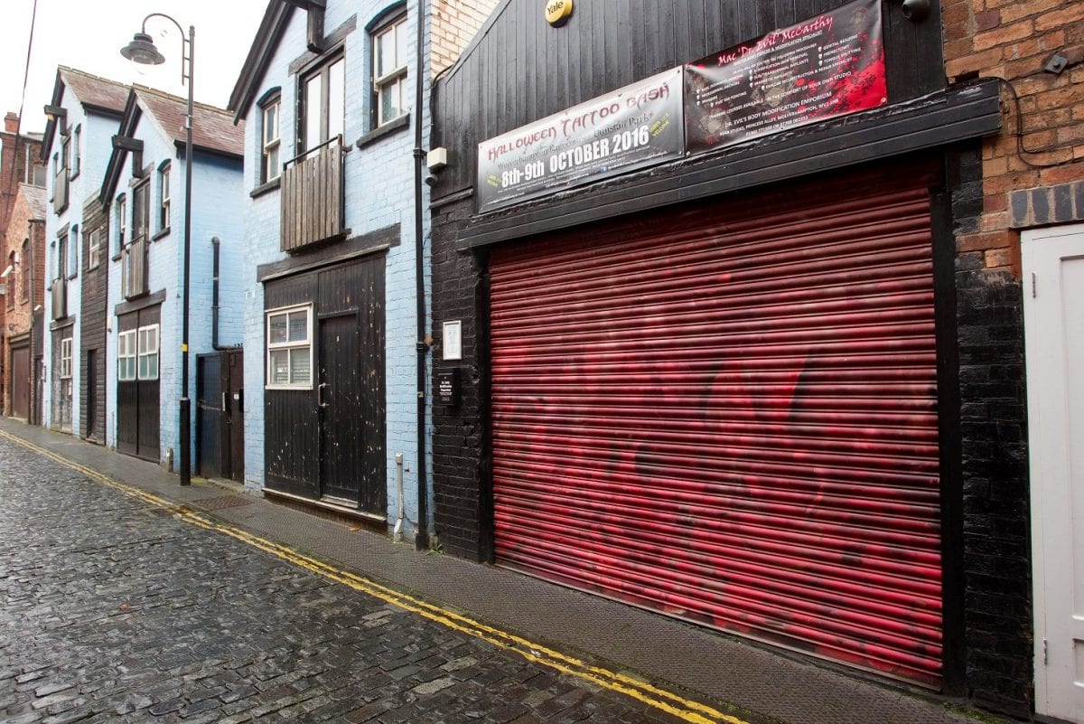 GV of "Dr Evils Body Modification Emporium" also known as "Punctured Body Piercing & Modification" in Princess Alley, Wolverhampton. (Friday 3 February 2017). A tattoo artist appeared in court yesterday (Fri) accused of splitting a customer's tongue, removing an ear and slicing off someone's NIPPLE. See NTI story NTITATTOO. Brendan McCarthy, 47, is accused of committing the bizarre offences at his salon, called Dr Evils Body Modification Emporium. The tattooist was arrested in December 2015 after concerns over his lack of medical qualifications, the unsuitability of his salon and unregulated actions. Yesterday (Fri), McCarthy appeared at Walsall Magistrates Court charged with three counts of causing grievous bodily harm with intent and three alternative counts of wounding without intent. The charges relate to Ezechiel Lott and two other unnamed customers. The offences are said to have taken place between August 2012 and July 2015, relate to the removal of a client's ear and nipple and splitting the customer's tongue. McCarthy, of Wolverhampton, West Mids., didn't plead to the offences and only spoke only to confirm his name, age and address during the short hearing.