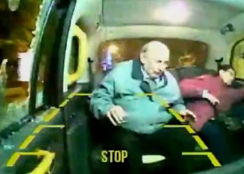 Video grab of the rock smashing into the back of a taxi injuring the two pensioners travelling in the back.  Four teenagers will be sentenced at Birmingham Youth Court today February 3, 2017, after being convicted of hurling stones through a taxi window - and leaving a 70-year-old passenger with a fractured skull.  See NTI story NTITAXI.  Shocking CCTV footage from inside the taxi shows the moment a rock smashes through the window, sending glass shards flying through the cab, and striking the woman on her forehead.  Birmingham Youth Court heard how the young louts - one aged 15, two 16 and a 17-year-old - pelted at least seven black cabs with stones as they travelled along Bristol Road on 25 May last year.  The three younger defendants all denied involvement but were found guilty of causing wounding and conspiracy to cause damage, while the 17-year-old admitted wounding but was found guilty of conspiracy to cause damage. None of the offenders can be named due to their age.  Police have praised the local community for coming forward to help convict the thugs.
Video grab of the rock smashing into the back of a taxi injuring the two pensioners travelling in the back.  Four teenagers will be sentenced at Birmingham Youth Court today February 3, 2017, after being convicted of hurling stones through a taxi window − and leaving a 70-year-old passenger with a fractured skull.  See NTI story NTITAXI.  Shocking CCTV footage from inside the taxi shows the moment a rock smashes through the window, sending glass shards flying through the cab, and striking the woman on her forehead.  Birmingham Youth Court heard how the young louts − one aged 15, two 16 and a 17-year-old − pelted at least seven black cabs with stones as they travelled along Bristol Road on 25 May last year.  The three younger defendants all denied involvement but were found guilty of causing wounding and conspiracy to cause damage, while the 17-year-old admitted wounding but was found guilty of conspiracy to cause damage. None of the offenders can be named due to their age.  Police have praised the local community for coming forward to help convict the thugs.