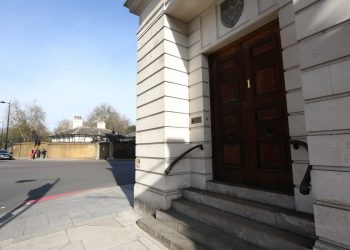 1 Grosvenor Gardens where the cannabis was found in relation to the grounds of Buckingham Palace (LEFT), Belgravia, central London. See National copy NNSTASH: Police uncovered a massive haul of cannabis being grown in a £15 million mansion just yards from Buckingham Palace. The drugs factory growing "£500,000 of weed" was raided by police inside the mansion on one of Britain's most expensive streets in posh Belgravia, central London. Around 30 bags of suspected drugs were seized from the five storey vacant property at around 7.30am on Friday morning, in Grosvenor Gardens. One cheeky squatter - part of a group that have taken over a neighbouring mansion - even tried to run off with a clear plastic bin liner filled with the telltale leaves.
