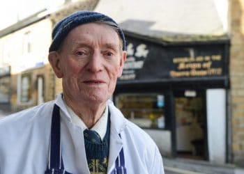 Frank Fisher, 87, is one of the oldest butchers in the country, but is uncertain of his shops future, pictured there near Sheffield, South Yorks., March 21 2017. See Ross Parry story RPYOLD: Britains oldest butcher who is the fourth generation to run the family business fears his dynasty is facing the chop - as he has no heirs to take over his lifes work. Dedicated Frank Fisher, 87, still works full time six days a week to keep the shop going. And although he is not yet ready to pin up his apron, he fears that once when he retires the business will go with him. The bachelor is the fourth of his generation to run the butchers, Fisher and Son Family Butcher's.