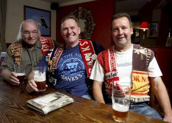 Joe Hill, Peter Hill & John Drew members of the Black Country Ale Tairsters, at their 18,000th pub. Two beer-loving friends raised a toast yesterday (Fri) to celebrate visiting their 20,000th bar in the world’s longest pub crawl which has lasted over 30 YEARS. See NTI story NTIPUBS. The group of pals - who call themselves the Black Country Ale Tairsters - have drunk in a different boozer every week since 1984 - back when a pint cost just 64p. And girls are banned from tagging along with them on their trips, which has taken in watering holes in every county in England, Wales, Scotland and Northern Ireland, The gang always wear homemade uniforms on each night out made of waistcoats fashioned from old beer towels. They hold the record for being the first to travel to pubs around the entire coastline of Great Britain and Northern Ireland. A few years ago they completed a seven-year quest to visit every pub in Wales after stopping off at all 11,000 of them. They have also been to every boozer in 11 Midlands counties and driven over 250,000 miles during their monster trip downing at least 46,500 pints. On Friday (3/3), the pair enjoyed a tipple at the Knot and Plough, Nottingham, to celebrate visiting 20,000 different pubs.