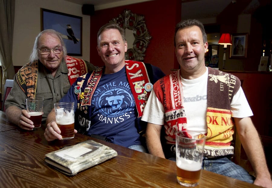 Joe Hill, Peter Hill & John Drew members of the Black Country Ale Tairsters, at their 18,000th pub. Two beer-loving friends raised a toast yesterday (Fri) to celebrate visiting their 20,000th bar in the world’s longest pub crawl which has lasted over 30 YEARS. See NTI story NTIPUBS. The group of pals - who call themselves the Black Country Ale Tairsters - have drunk in a different boozer every week since 1984 - back when a pint cost just 64p. And girls are banned from tagging along with them on their trips, which has taken in watering holes in every county in England, Wales, Scotland and Northern Ireland, The gang always wear homemade uniforms on each night out made of waistcoats fashioned from old beer towels. They hold the record for being the first to travel to pubs around the entire coastline of Great Britain and Northern Ireland. A few years ago they completed a seven-year quest to visit every pub in Wales after stopping off at all 11,000 of them. They have also been to every boozer in 11 Midlands counties and driven over 250,000 miles during their monster trip downing at least 46,500 pints. On Friday (3/3), the pair enjoyed a tipple at the Knot and Plough, Nottingham, to celebrate visiting 20,000 different pubs.