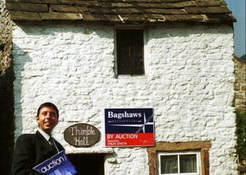 Mark Bramell from estate agents Bagshaws. Derbyshire is home to a property once listed as the smallest detached house in Britain - Thimble Hall in Youlgreave. See NTI story NTITHIMBLE. It dates back to 1756 and measures just 11ft 10in x 10 ft 3in and stands 12 ft 2in high. Stretch out your arms and you practically touch either side of the rooms. In August 2000, the Guinness Book of Records proclaimed it the smallest detached property in Great Britain. And yet 100 years ago, a family of eight lived there. Such is its quirkiness, when it went up for auction in 1999 it sparked bids from all over the world including Hong Kong, Athens and New York. It's claimed there was even an offer from Uri Geller.