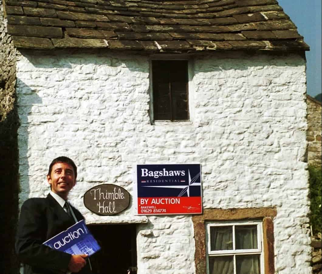 Mark Bramell from estate agents Bagshaws. Derbyshire is home to a property once listed as the smallest detached house in Britain - Thimble Hall in Youlgreave. See NTI story NTITHIMBLE. It dates back to 1756 and measures just 11ft 10in x 10 ft 3in and stands 12 ft 2in high. Stretch out your arms and you practically touch either side of the rooms. In August 2000, the Guinness Book of Records proclaimed it the smallest detached property in Great Britain. And yet 100 years ago, a family of eight lived there. Such is its quirkiness, when it went up for auction in 1999 it sparked bids from all over the world including Hong Kong, Athens and New York. It's claimed there was even an offer from Uri Geller.