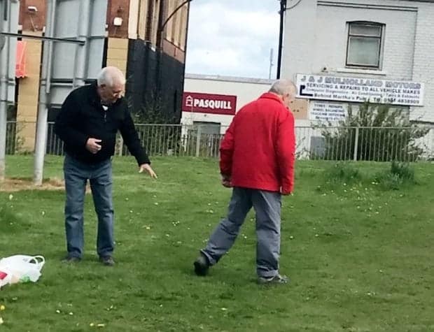 **ONLINE EMBARGO UNTIL MIDDAY, APRIL 19, 2017**
 
 This is the funny moment two OAPs settled an old score with a fist fight outside a care home - before one helps the other look for his glasses.  See SWNS story SWFIGHT.  Onlookers said the pair crossed paths with one accusing the other of "ignoring him for months".  The argument got heated - with the pair both setting down the carrier bags - before they squared up to each other with the fists clenched on a nearby green.  A video taken by a baffled passerby, shows the pair with their arms raised, throwing and landing punches outside the Hawthorn Court care home in Hebburn, Tyne and Wear.  The man in the black jacket can be seen pointing and ranting, before his opponent punches him.  But after a few fists fly, they both stop to find a pair of specs belonging to the man in red - apparently knocked off by the first punch.