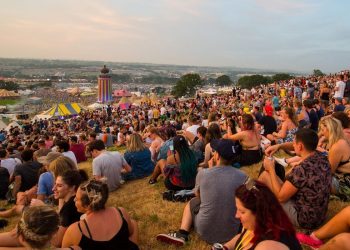 Revelers enjoy the sunset at Glastonbury Festival at Worthy Farm, Somerset, as the hottest day of the year comes to an end. June 21 2017.