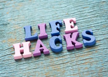 Life hacks phrase made of wooden colorful letters on vintage background