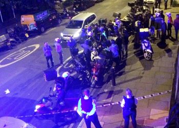 The scene at 22:25opm July 13 2017 on the Hackney Road junction with Queensbridge Road after reports of a serial acid attacker. See National News story NNACID; A man left with 'life changing' injuries following a spate of acid attack robberies was left screaming in agony as dozens of people rushed into the street to try and help him, witnesses said. He was targeted in a suspected robbery last night (Thurs) during a series of five attacks by men on a moped across north London in just 72 minutes, which police believe are linked. A major investigation has now been launched and a teenager has been arrested in connection with the attacks. The most serious has left a man with 'life-changing injuries', detectives said.
