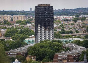 The charred remains of Grenfell Tower remains dominant in the landscape, a bleak memorial to some 80 residents who burnt to death when the apartment caught fire nearly a month ago, July 11 2017.