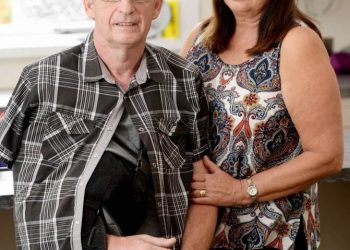 Microlight pilot Eric Rhodes whon had a lucky escape after crashing near Skegness in May - Pictured with his wife Denise.  See NTI story NTIFALL.  A Leicestershire microlight pilot whose aircraft plunged to earth from 2,300 feet when a wing collapsed has spoken of his escape.  Eric Rhodes, 57, of Asfordby, near Melton, fell to earth within seconds of the catastrophic incident, suffering several fractured ribs and vertebrae, a punctured lung and wrenching his right shoulder from its socket.  Eric was flying from Skegness to Boston Aero Club, in Lincolnshire, where he is a member, at 65mph at about 4.15pm on Sunday, May 28 when the drama unfolded.   He said: "I'd only been in the air 10 minutes. There was a terrific bang and the aircraft shook. Something hit me under the arm and ripped my shoulder out. I was lying down across the aircraft looking at the ground.  "I could see the steering mechanism dangling from underneath the aircraft and I could see the ground coming towards me at a terrific speed.  "I managed to pull myself up, looked up and saw the wing had folded and I was spiralling down."  In the handful of seconds Eric's aircraft plunged straight through a tiny gap in the canopy of a densely wooded copse in Wainfleet St Mary without hitting a single tree, missing deep lakes feet away on either side.