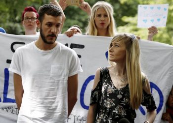 Connie Yates and Chris Gard the parents of Charlie Gard and supporters at Great Ormand Street Hospital in London hand over a petition containing over 350,000 signatures supporting their case that their son, Charlie, should be allowed to travel and receive treatment. July 9 2017.