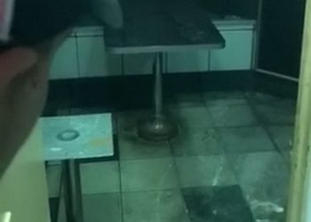 Shocking footage show what appears to be human waste on the floor of a west London Burger King branch after localised flooding covered the tiles in a thick brown sludge. See story SWBURGER. Two videos, taken by an outraged customer, show the filthy downstairs area of the Burger King branch in Gloucester Road just after 10pm on 8 August. But when the customer complained to a member of staff and pointed out the revolting conditions - he was told to leave the eatery. The customer, who has asked to remain anonymous, discovered the revolting room when he and two friends tried to find the toilets at the fast food joint. The footage shows the customer walking through the disgusting downstairs area pointing out what appears to be an open hole in the basement of the restaurant. The customer stares down the hole and announces it is "the sewer" to his friend who was filming the shocking conditions at the fast food joint.
