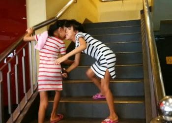 The desperate family of conjoined ten-year-old twins attached at the head are appealing for help to raise £75,000 to separate them.  See SWNS story SWTWINS.  Joy and Joyce Magsino were born with angular frontal partial craniopagus - they are attached at the forehead.  A touching video released by their father devoted Patrick Magsino, 30, shows them taking selfies and playing video games like any other ten-year-old girls.  Doctors in Albay in the Philippines said it was possible to separate them with a risky and costly operation in 2012 - and the family began saving up ever since.  Their father Patrick earns £6 a day as a market assistant porter, while his wife Jomarie migrated to Qatar to work as a maid to save up.  But the family has only raised around a third of the cash needed - and are now appealing for help with an online fundraising page.