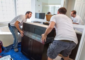 New bathroom cabinets with granite countertopsBathroom renovation and granite installation