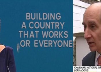 The letter 'F' falls off the slogan behind Theresa May as she makes her speech  at the Try Conference in Manchester