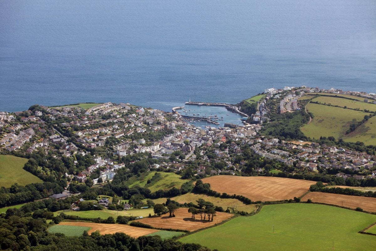Locals who have been priced out of their pretty fishing village have voted to ban second-home owners from buying new builds in a landslide victory. Mevagissey, in Cornwall, has seen a boom in the number of houses being purchased as holiday homes over recent years.