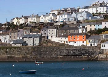 Locals who have been priced out of their pretty fishing village have voted to ban second-home owners from buying new builds in a landslide victory. Mevagissey, in Cornwall, has seen a boom in the number of houses being purchased as holiday homes over recent years.