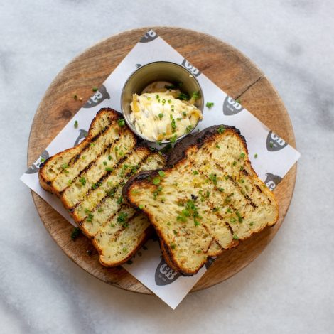 Caravan's Jalapeño cornbread, chipotle butter, coriander, lime Caravan