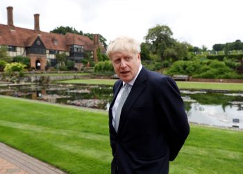 Boris Johnson, a leadership candidate for Britain's Conservative Party, looks on during his visit at Wisley Garden Centre in Surrey, Britain, June 25, 2019. REUTERS/Peter Nicholls