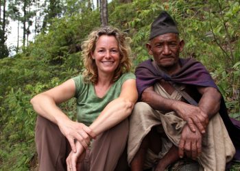 Programme Name: Kate Humble: Living with Nomads - TX: 05/06/2015 - Episode: Kate Humble: Living with Nomads - Nepal (No. 1) - Picture Shows: Presenter Kate Humble sat with Mein Bahadur (Raute elder), Nepal
  - (C) Indus Films - Photographer: Kate Owen