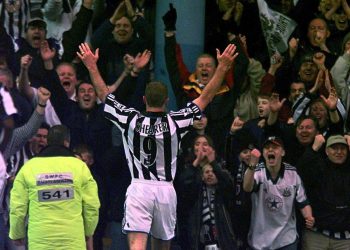 This picture can only be used within the context of an editorial feature. Newcastle United captain Alan Shearer celebrates with the fans after scoring Newcastle's second goal against Sheffield Wednesday during their FA Premiership match at Hillsborough.   * Final Score: Sheffield Wednesday 0  Newcastle United 2.