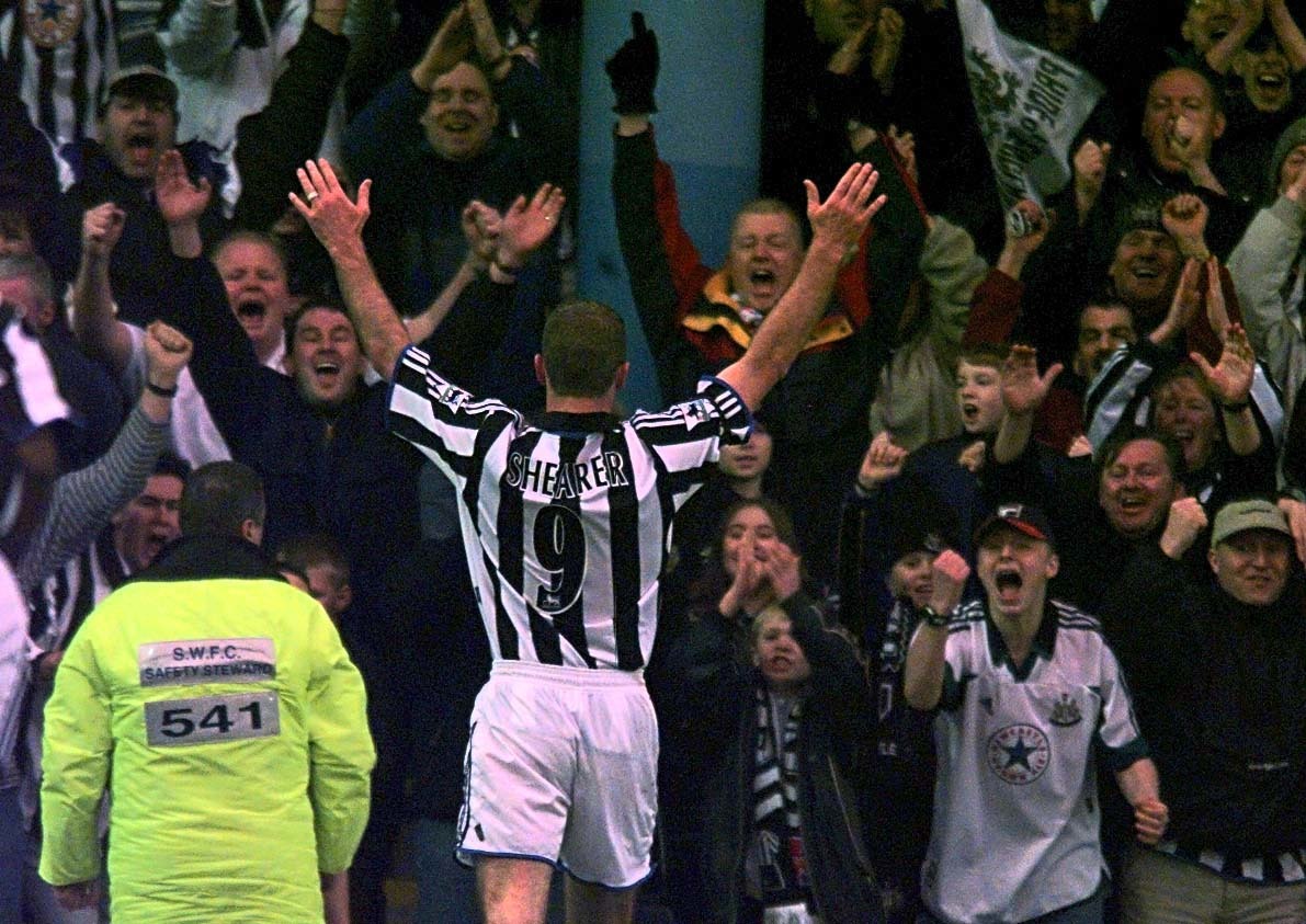 This picture can only be used within the context of an editorial feature. Newcastle United captain Alan Shearer celebrates with the fans after scoring Newcastle's second goal against Sheffield Wednesday during their FA Premiership match at Hillsborough. * Final Score: Sheffield Wednesday 0 Newcastle United 2.