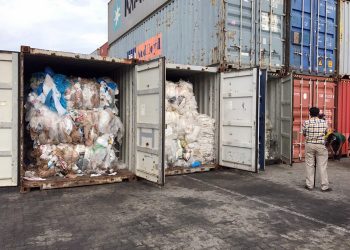In this Tuesday, July 16, 2019, photo, containers loaded with plastic waste are placed at country beach city, Sihanoukville Port, southwest of Phnom Penh, Cambodia. A Cambodia's committee to investigate the sources of the trash discovered packing in more than 80 containers at country beach city, Sihanoukville Port, is needing seven to ten days to conclude their investigative, an official said Wednesday, July 17, 2019. (AP Photo/Sea Seakleng)