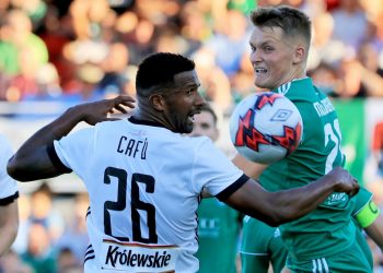 Legia Warszawa's Cafu and Cork's Sean McLoughlin battle for the ball during the UEFA Champions League first qualifying round, first leg match at Turners Cross, Cork.