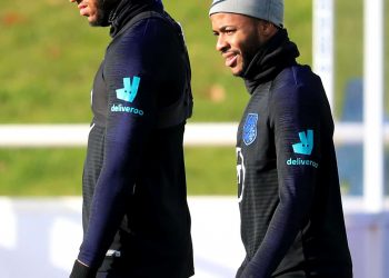 England's Joe Gomez (left) and Raheem Sterling during the training session at St George's Park, Burton. Credit;PA