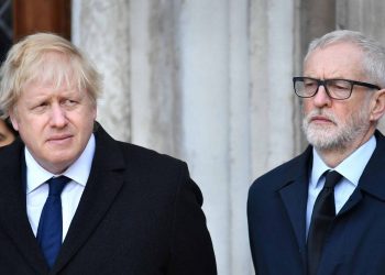 Boris Johnson and Jeremy Corbyn at London Bridge vigil (PA)