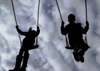 children on swings