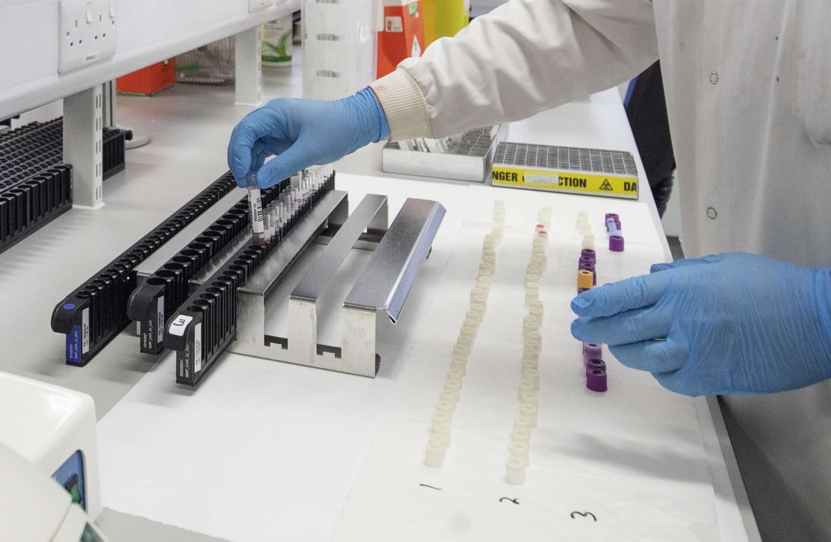 Clinical support technician Douglas Condie extracts viruses from swab samples so that the genetic structure of a virus can be analysed and identified in the coronavirus testing laboratory at Glasgow Royal Infirmary, Glasgow.