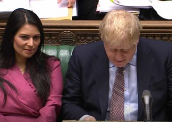 Home Secretary Priti Patel and Prime Minister Boris Johnson during Prime Minister's Questions in the House of Commons, London.