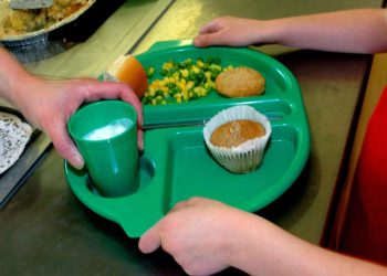 File photo dated 28/08/09 of a school meal being served as around 900,000 children from low-income families will lose their right to free school meals under proposals unveiled in the Conservative manifesto, an educational think tank has warned.
