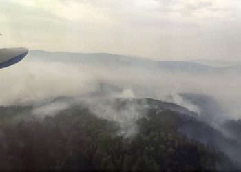 This image taken from video provided by Russian Emergency Ministry, shows a view of a forest fire from a Russian Emergency Ministry multipurpose amphibious aircraft in the Trans-Baikal National Park in Buryatia, southern Siberia, Russia, Thursday, July 9, 2020. About 910 hectares of forest were alight over this area of the Russia's region, according to the ministry of emergency situations. (Russian Emergency Ministry Press Service via AP)