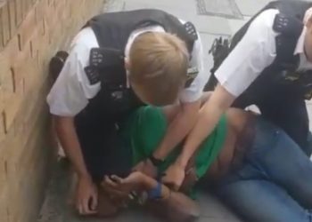Undated handout videograb of a Metropolitan Police officer who has been suspended and another placed on restricted duties after the video appeared to show one of them kneeling on man's neck.