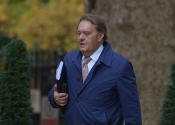 Conservative MP John Hayes arrives in Downing Street, London.