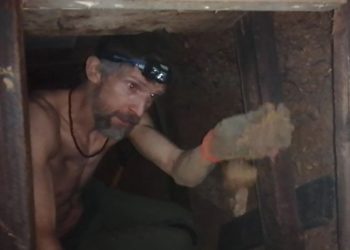Undated handout video grab issued by HS2 Rebellion of a protester known as 'Larch' in part of a 100ft tunnel network dug in secret under Euston Square Gardens in central London, which they claim is at risk from the HS2 line development. Issue date: Tuesday January 26, 2021.Credit;PA