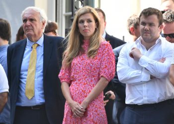 Eddie Lister (L) alongside Carrie Symonds.