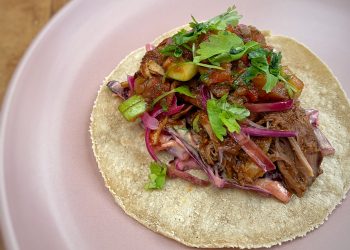 Pork tacos with brown sauce salsa