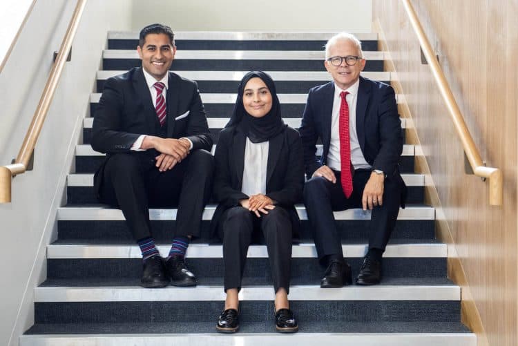 (L-R) NCS headteacher Mouhssin Ismail, student Ayesha Karim and City of London Academy CEO Mark Emmerson. Credit;SWNS