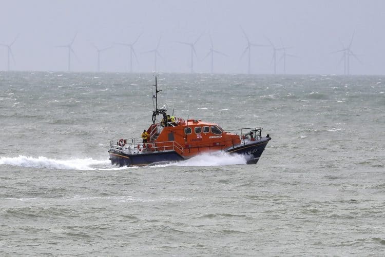 A RNLI lifeboat continues it search for the missing two fishermen that went missing near Seaford, Sussex, after their fishing boat, Joanna C, sank off the coast near Seaford, East Sussex on Saturday.