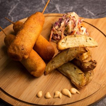 Vegan Corn Dog with Potato Wedges and Crunchy Slaw