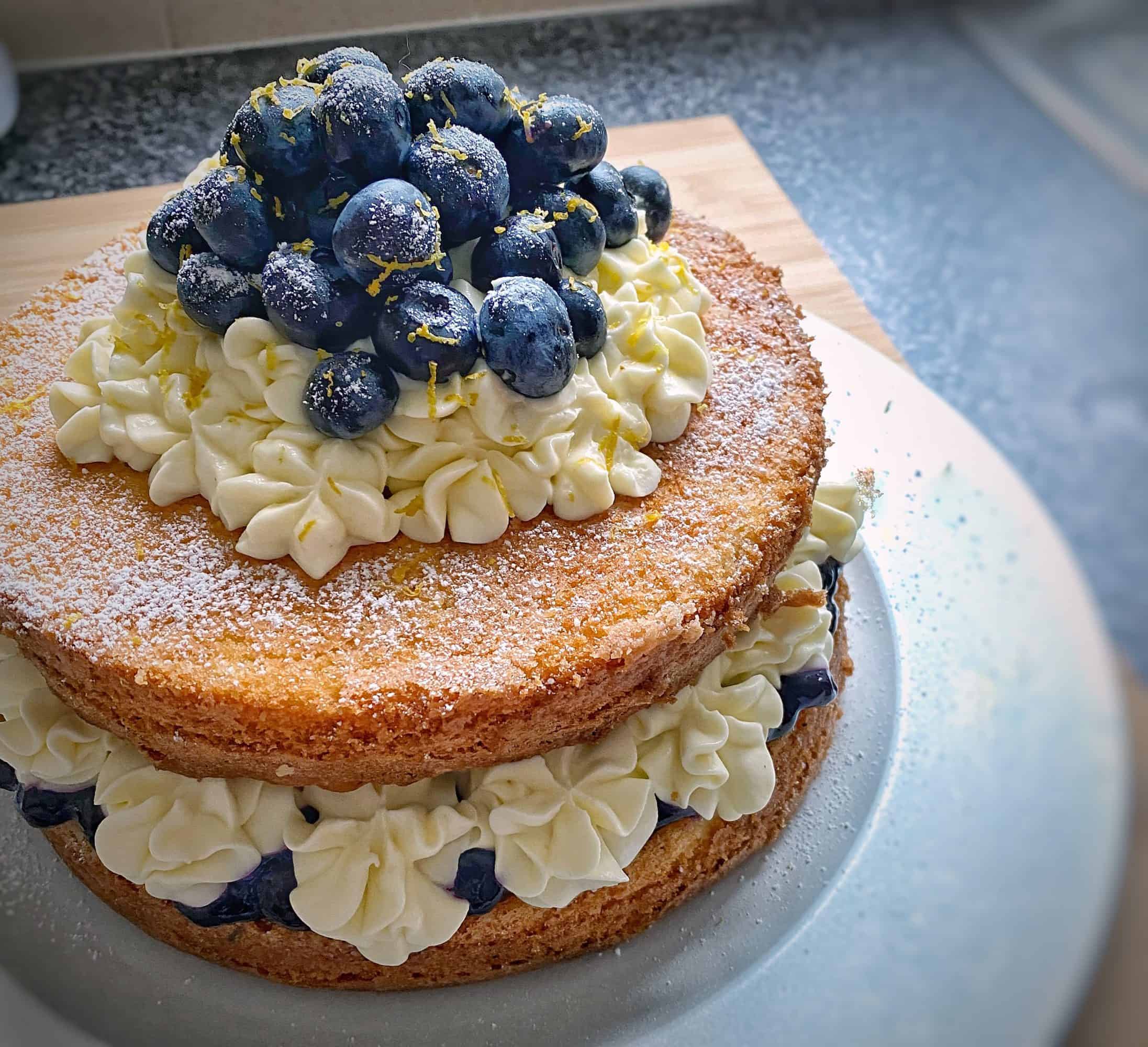Victoria sponge cake recipe, with blueberries and cream