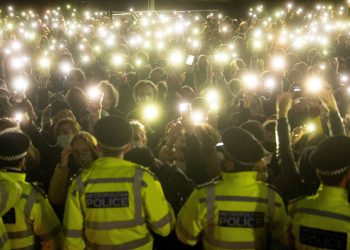 File photo dated 13/3/2021 of people in the crowd turn on their phone torches as they gather in Clapham Common, London, for a vigil for Sarah Everard. Former Metropolitan Police officer Wayne Couzens, 48, will appear at the Old Bailey in London, on the first day of a two-day sentence hearing after pleading guilty to the kidnap, rape and murder of Sarah Everard. Issue date: Wednesday September 29, 2021.