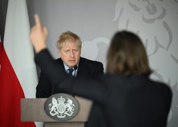 Boris Johnson takes a question from Ukrainian journalist Daria Kaleniuk during a press conference at the British Embassy in Warsaw.