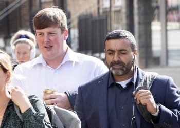 PC Sukhdev Jeer (right) and PC Paul Hefford arriving for a misconduct hearing at Empress State Building, London. Credit;PA