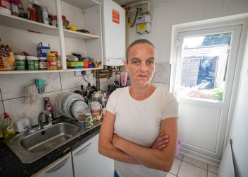 Kelly Thomson at her home in Slough.See SWNS story SWTPdonate. A starving single mum says her faith in humanity has been restored after generous Brits donated more than £1.2k in just a few hours to help feed her kids. Kelly Thomson, 43, revealed this week that she has twice been hospitalised due to malnutrition amid the cost of living crisis.She says she has been foregoing meals so her kids can eat - and has even thought about begging to make ends meet.Kelly decided to launch a GoFundMe page this morning (19/8), with a target of just £50 set.